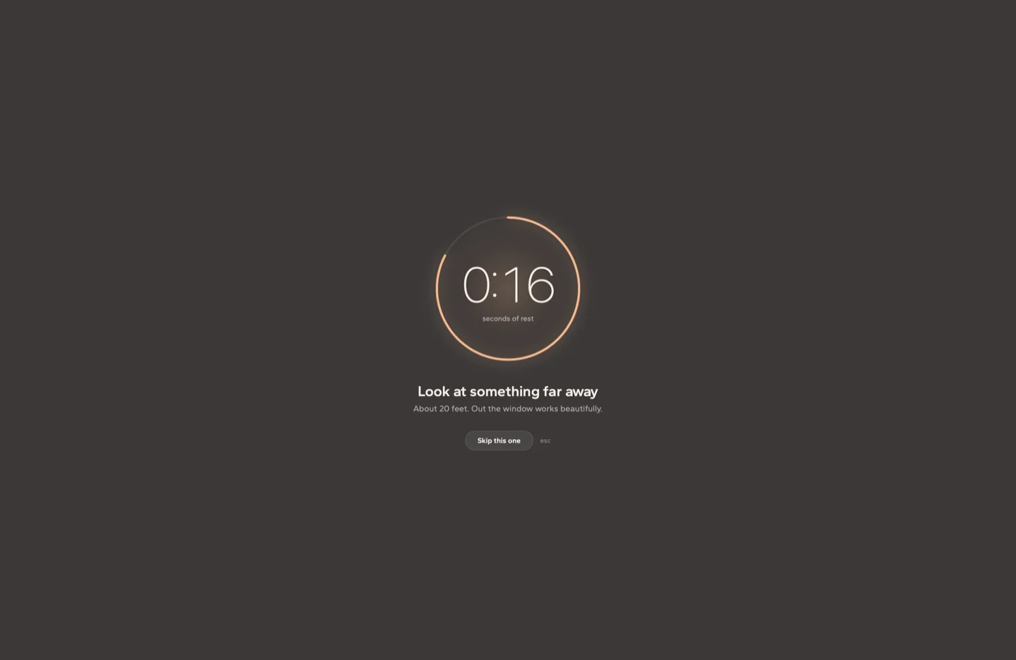 The full-screen break overlay dimming the desktop, with a glowing ring counting 16 seconds of rest and the words 'Look at something far away'.